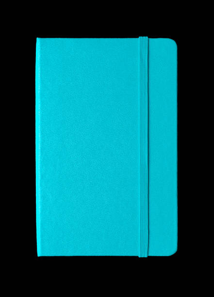 istock Aqua blue closed notebook isolated on black 1189300653