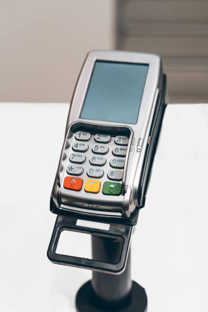 istock Credit card payment terminal in a shop 1189300656