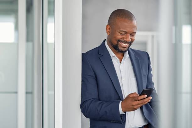 istock Mature businessman using smartphone 1189302147