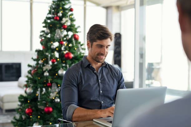 istock Businessman working during christmas time 1189303404