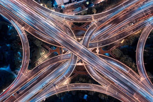 istock Urban highway traffic shanghai at night 1189305682