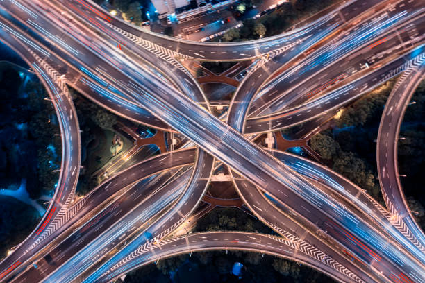 istock Urban highway traffic shanghai at night 1189305822