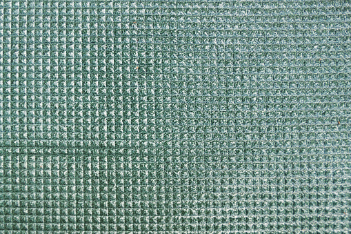 Green travel foam mat, flat background photo texture