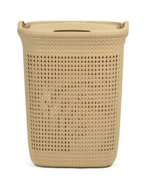 Photo of Plastic beige laundry basket isolated on white background