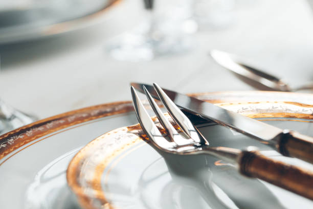 istock Close up shot of table setting for fine dining with cutlery and glassware 1189307511