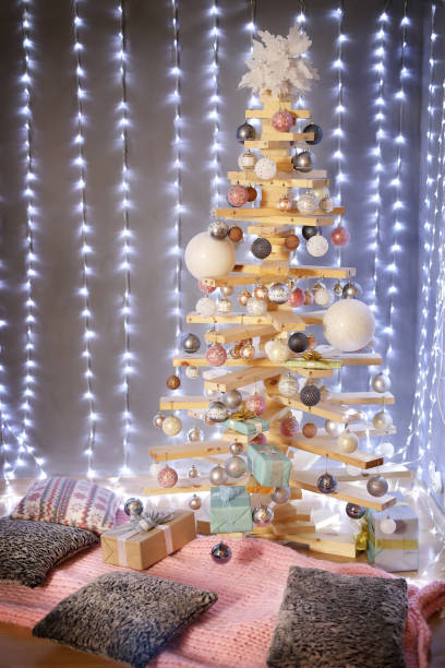 Alternative Christmas tree in the interior . stock photo