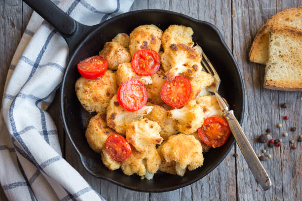 istock Cooked cauliflower, a healthy vegetarian dish 1189310202