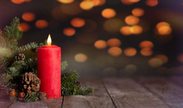 istock Candle and fir branches 1189311389