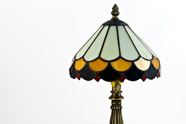Female hands choosing a lampshade