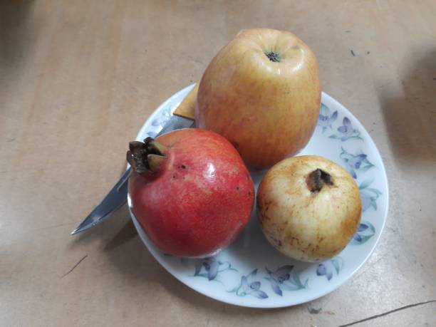 istock The best fruits like Garva Apple pomegranate. 1189314547