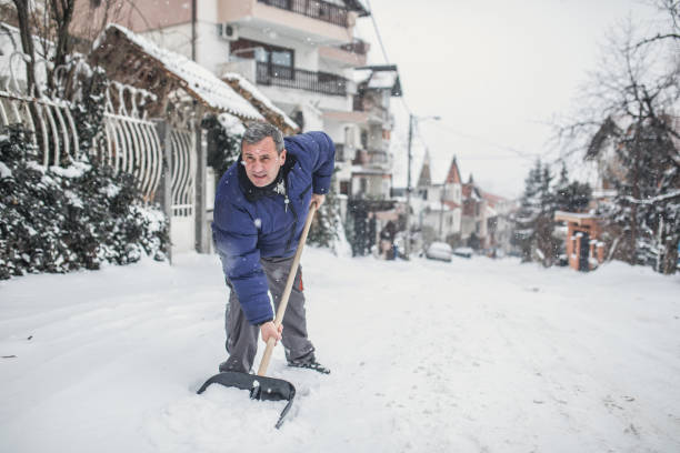 istock A senior man is ready to clear the snow 1189316771
