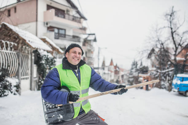 istock An old man is happy about clearing snow 1189316950