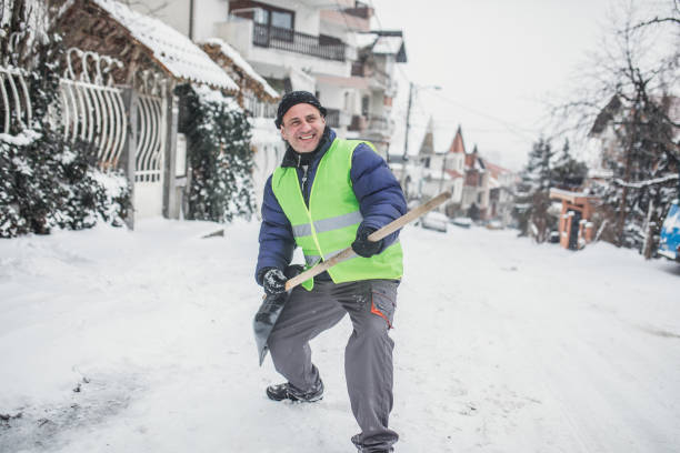 istock An old man is happy about clearing snow 1189316976