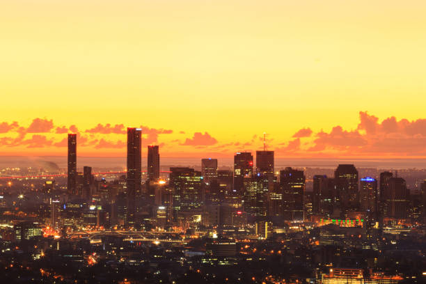 istock Illuminated Cityscape Against Sky During Sunset 1189318695