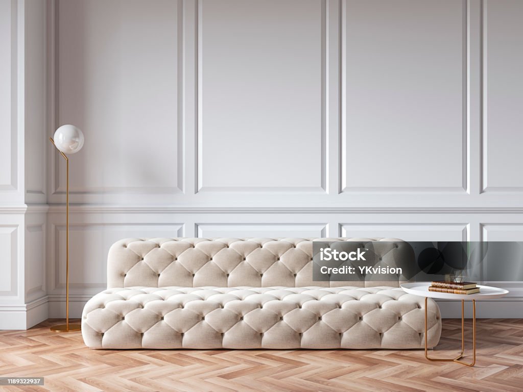 Classic white interior with capitone chester sofa, mouldings, wooden floor, floor lamp, coffee table. 3d render illustration mock up. Herringbone Stock Photo
