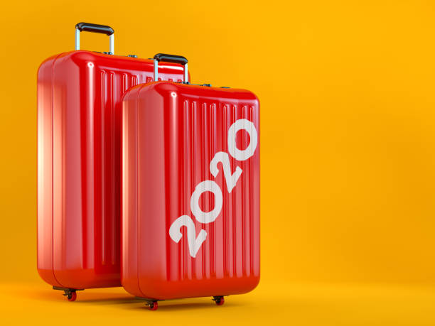 istock 2020 Holiday Concept With Red Suitcases 1189323149