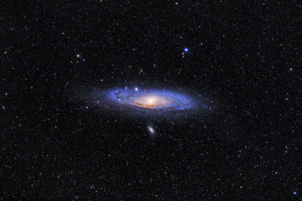 istock Andromeda Galaxy (M31) and its satellite galaxies (M32 and M110) in Andromeda constellation against widefield starry sky 1189323263