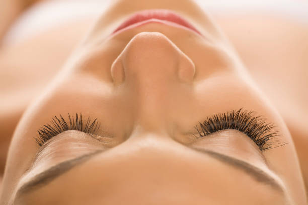 istock comaprison of natural and extended eyelashes 1189325299