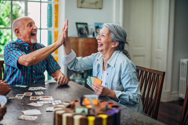 istock Senior couple playing cards 1189328581