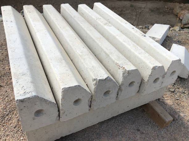istock Piled concrete curbstones. Construction material for road construction works 1189329055