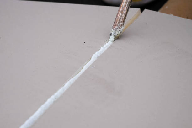 istock Roofing insulation, installation of insulation sheets on foam 1189329711