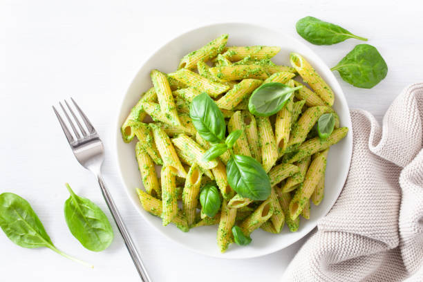 istock penne pasta with spinach basil pesto sauce 1189330889