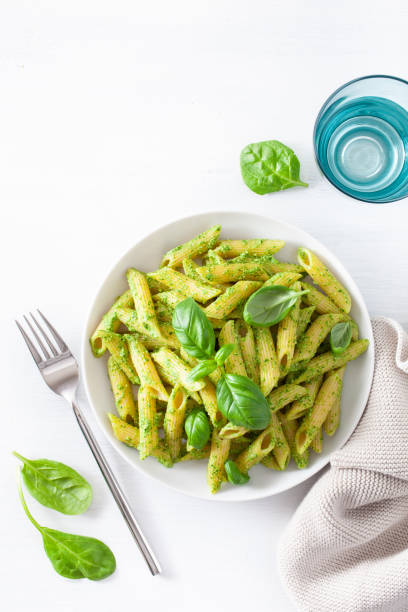 istock penne pasta with spinach basil pesto sauce 1189331152