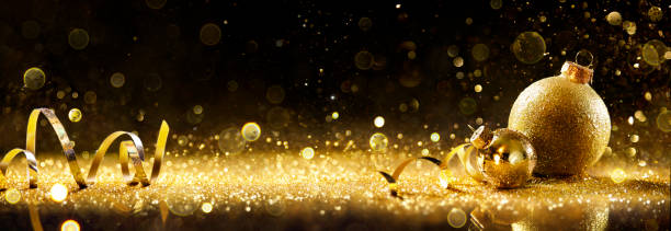 Golden Streamer And Balls With Streamer On Glitter