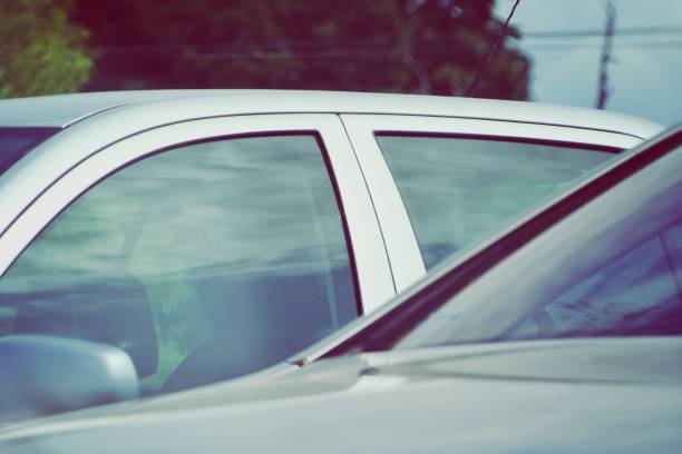 istock Group of cars parked in a row 1189336992