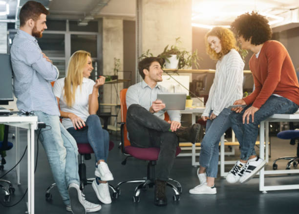 istock Modern creative team discussing business strategy in office 1189339159