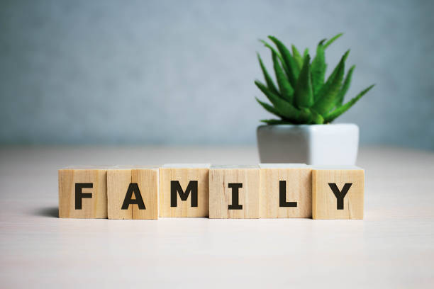 Stock photo family word on a wooden blocks Stock photo family word on a wooden blocks family word stock pictures, royalty-free photos & images