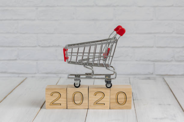 istock trolley on 2020 new year block ,  shopping concept 1189342364