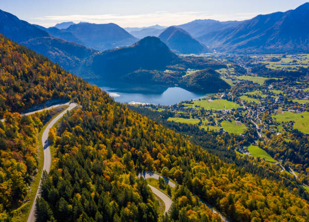 istock View of road on slope and lake 1189342706