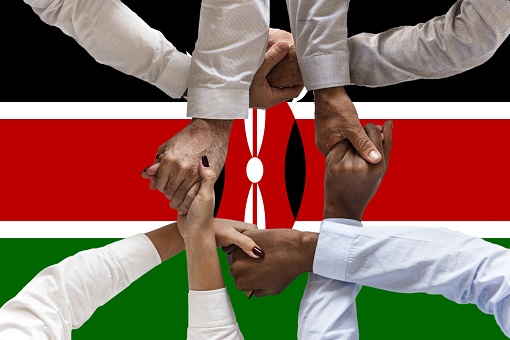 Flag of Kenya, intergration of a multicultural group of young people.