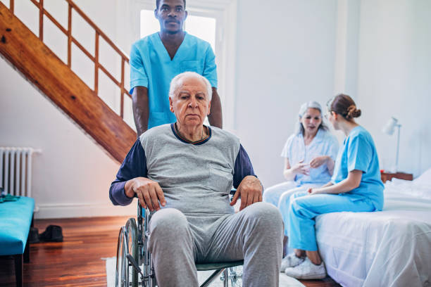 istock Senior paraplegic in nursing home 1189347609