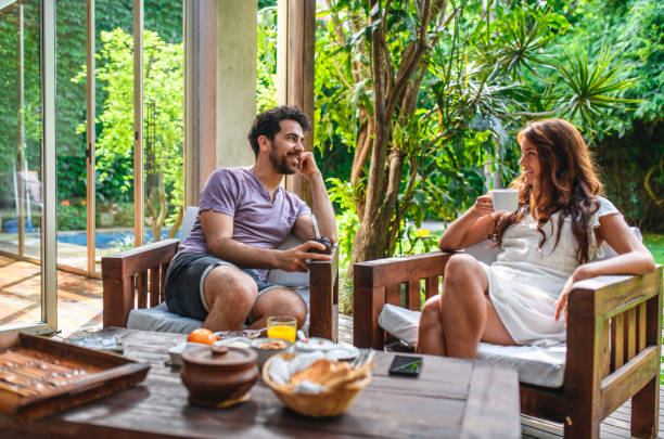 istock Young Couple Spending Leisurely Weekend Morning on Deck 1189350220