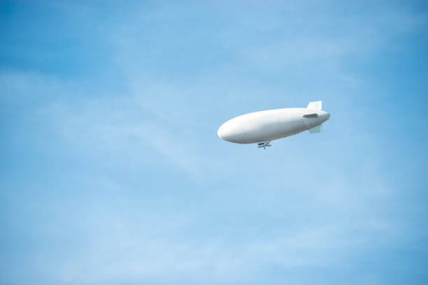 istock zeppelin on the blue sky in summer time 1189350702