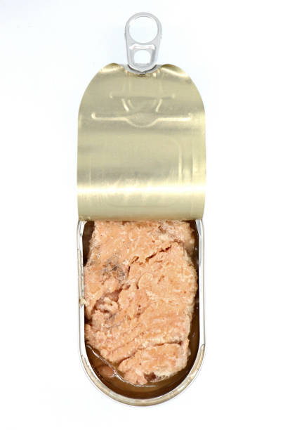 istock Canned salmon in a half-open tin 1189351706