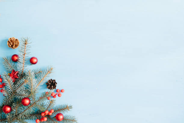 istock Christmas decoration on a blue wooden background, flat lay. Space for text 1189354670
