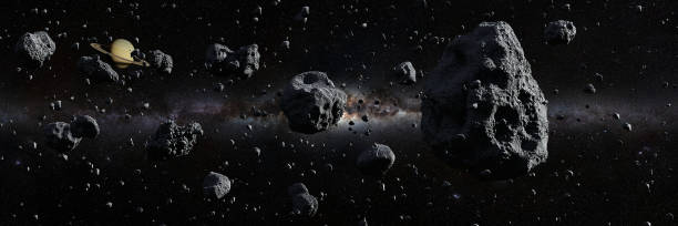 asteroid belt, debris in the solar system asteroids in deep space surrounded by dust, panorama banner asteroid belt photos stock pictures, royalty-free photos & images