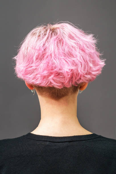 istock Woman with pink short hairstyle. 1189355940