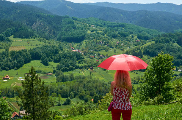 istock Woman enjoying landscape 1189356392