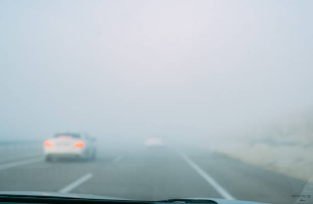 Foggy Road Through Car Window
