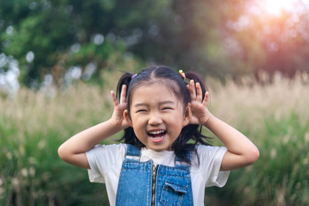 istock Little girl Playing games 1189356463