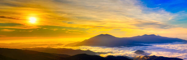 istock Amazing Sunrise Over Misty Landscape. 1189356471