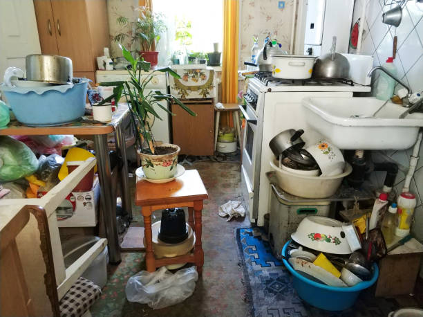 istock mess and dump. An old room with lots of things. Devastation. Very small housing 1189357362