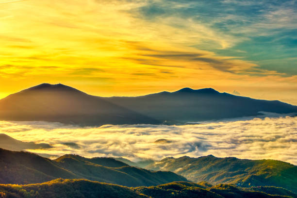 istock Amazing Sunrise Over Misty Landscape. 1189357480