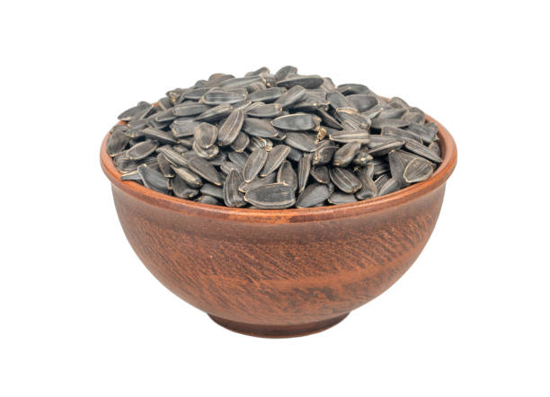 istock Sunflower seeds in bowl 1189358491