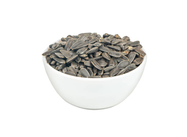 istock Sunflower seeds in bowl 1189358527