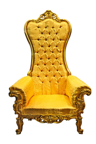 Baroque luxury golden armchair isolated on white background in close-up